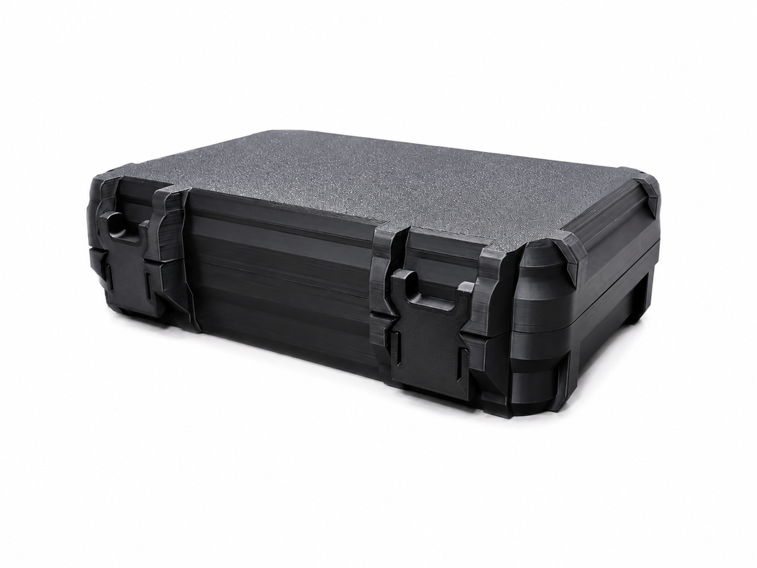 Black CoinClutch3D 50-count 2x2 coin flip storage case closed on a white background