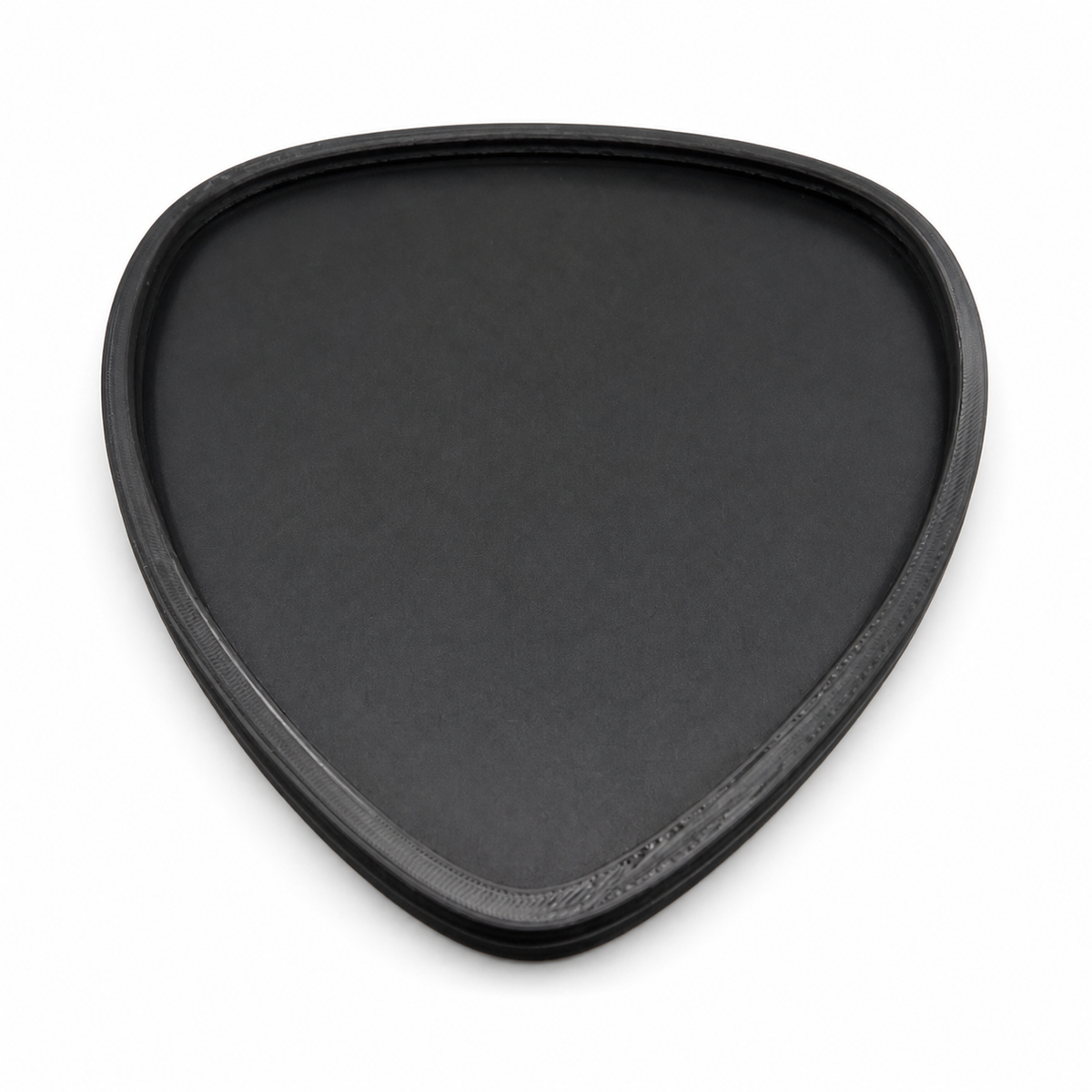 Black Pick Out guitar pick-shaped tray centered on a white background, top view showing its rounded triangular rim
