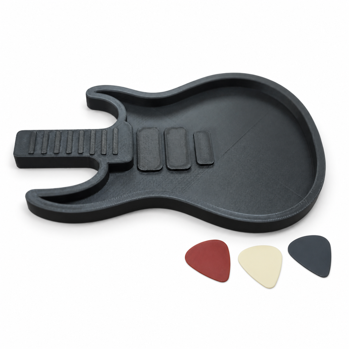 Black Richard electric-guitar-shaped pick holder from the opposite angle on a white background